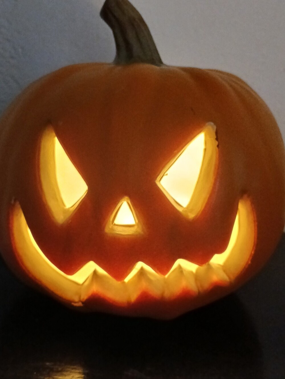 Orange plastic jack-o'-lantern Halloween decoration